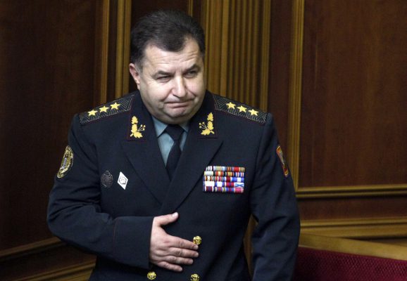 Newly appointed Defence Minister Stepan Poltorak acknowledges deputies during a session of parliament in Kiev December 2, 2014. Ukrainian President Petro Poroshenko nominated his foreign and defence ministers for new terms on Tuesday, signalling a major change in policy is unlikely in the conflict with pro-Russian separatists in the east.  REUTERS/Valentyn Ogirenko (UKRAINE - Tags: POLITICS MILITARY)